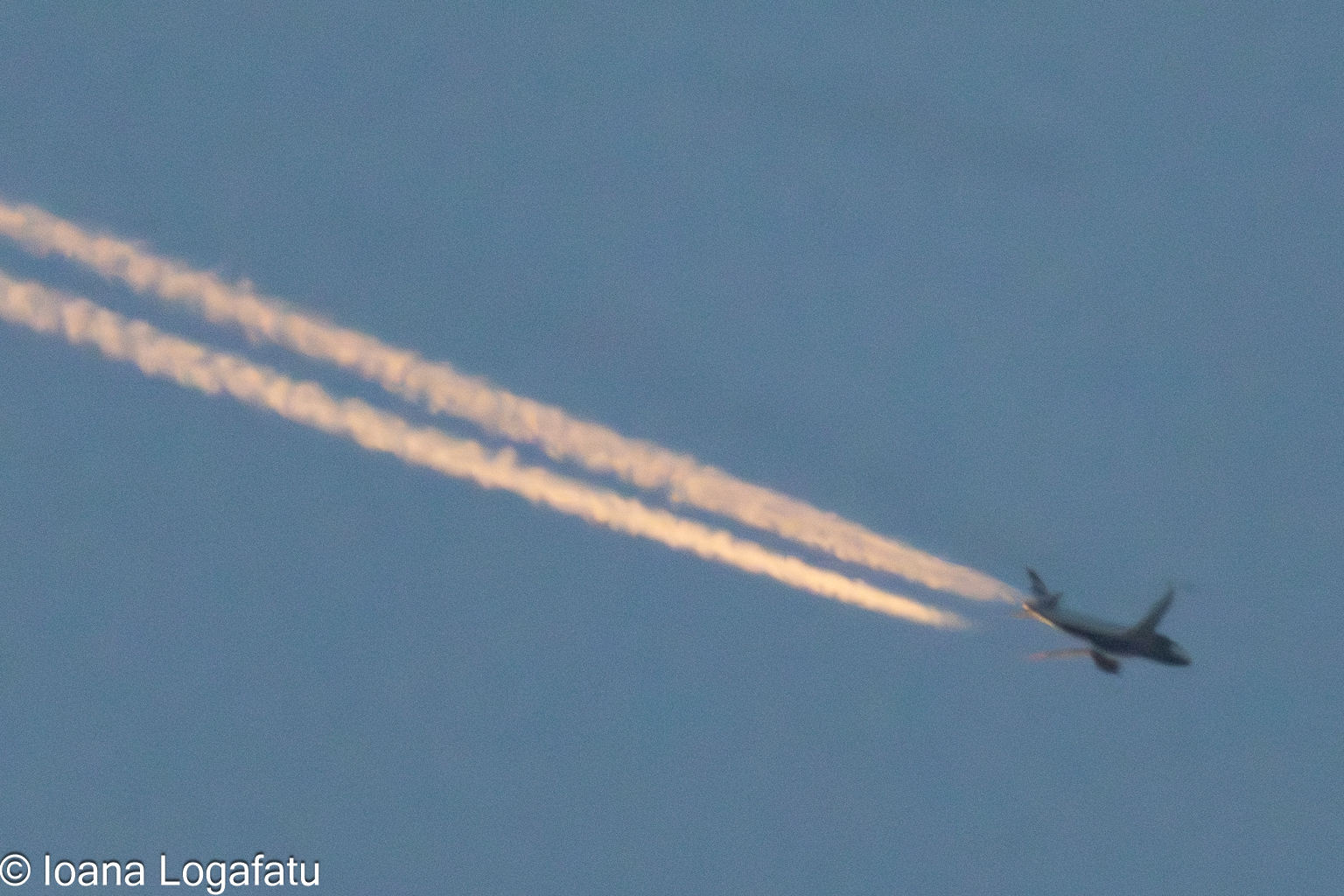 Jets carving trails across the dusky evening sky